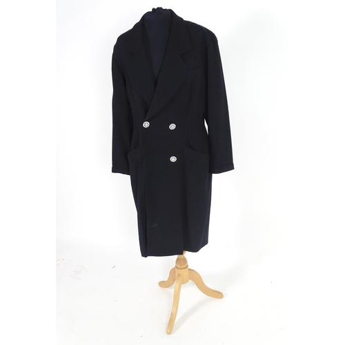 721 - A ladies Jaegar black wool double breasted jacket. Bust size approx 37