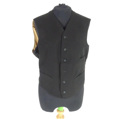 727 - A vintage bespoke mens black wool formal jacket and matching waistcoat. Chest size 38