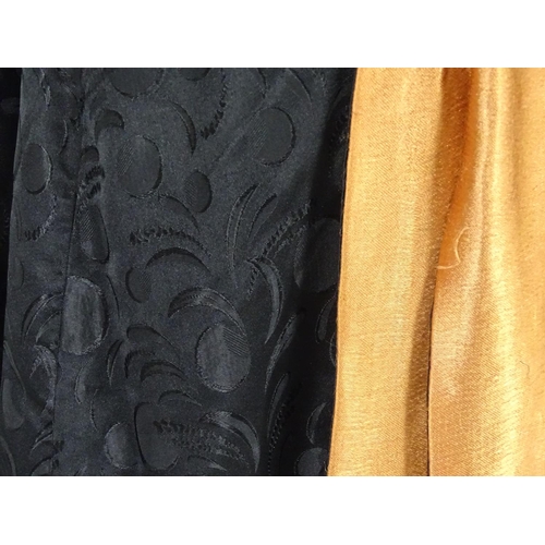 730 - A bespoke vintage ladies black evening cape, with padded collar, tie to neck. Bronze/orange lining. ... 