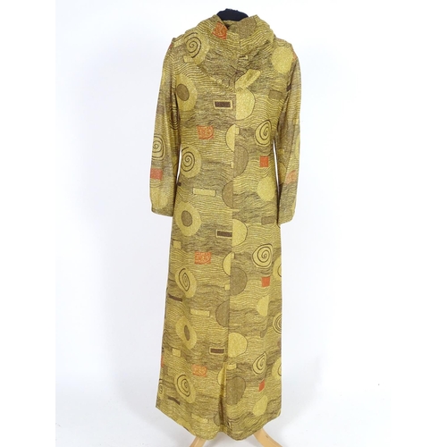 731 - A bespoke vintage ladies gold lurex evening dress with hood c1960's. Gold with abstract patterns. Bu... 