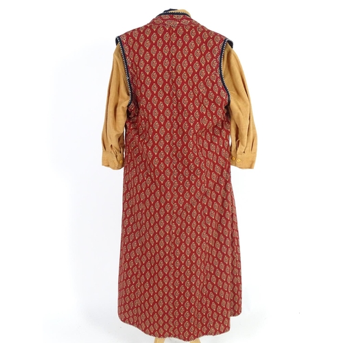 732 - A vintage mens Orvis long line waistcoat, rust coloured with paisley patterns size M along with a Ch... 