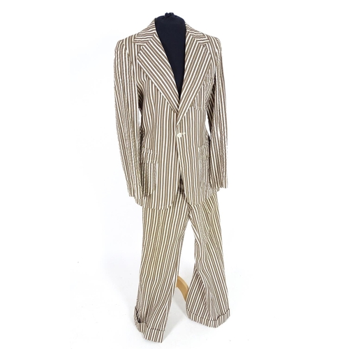 735 - 2 vintage stripy suits by Austins, a light brown and cream striped jacket and trousers along with a ... 