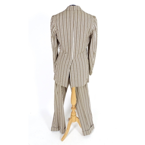 735 - 2 vintage stripy suits by Austins, a light brown and cream striped jacket and trousers along with a ... 