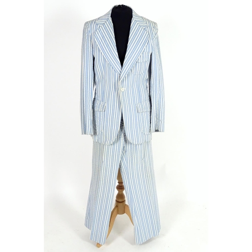 735 - 2 vintage stripy suits by Austins, a light brown and cream striped jacket and trousers along with a ... 