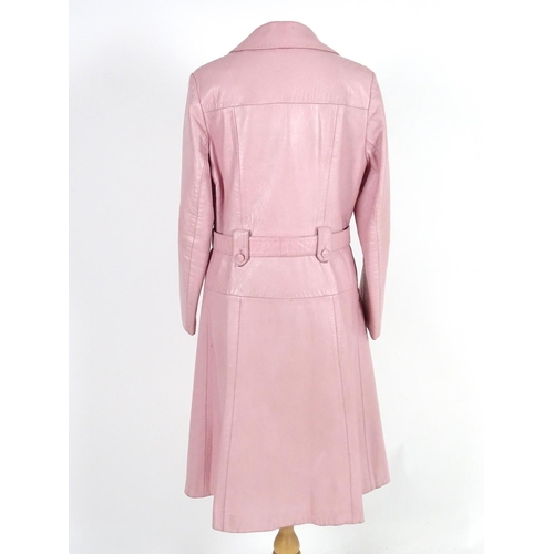 736 - A vintage Elma double breasted pink long line leather jacket, with matching belt, c1970's. Bust size... 