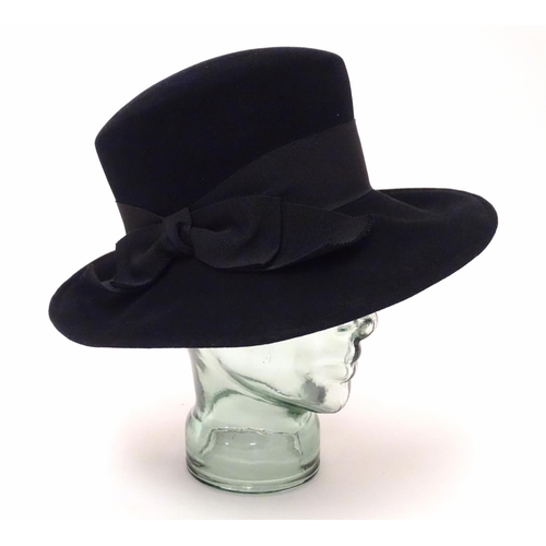 739 - A ladies black felt hat