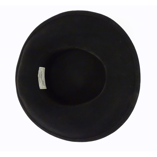 739 - A ladies black felt hat