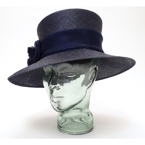 740 - A ladies navy hat