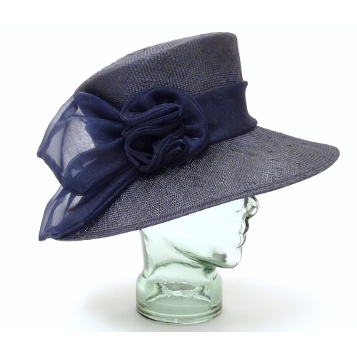 740 - A ladies navy hat