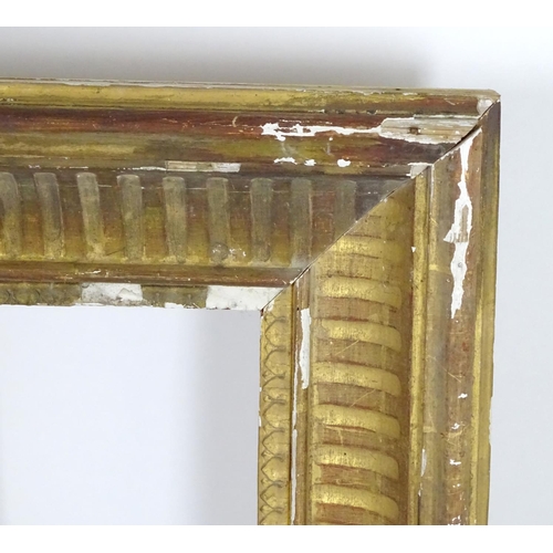 1690 - A pair of gilt and gesso moulded picture frames. Approx. 39 1/4