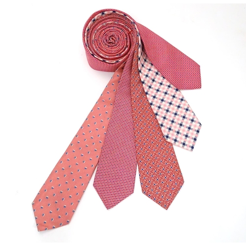 744 - 5 Turnbull & Asser, London, silk ties, in red, pink and blue designs. (5)