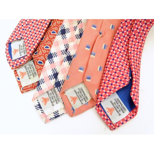 744 - 5 Turnbull & Asser, London, silk ties, in red, pink and blue designs. (5)