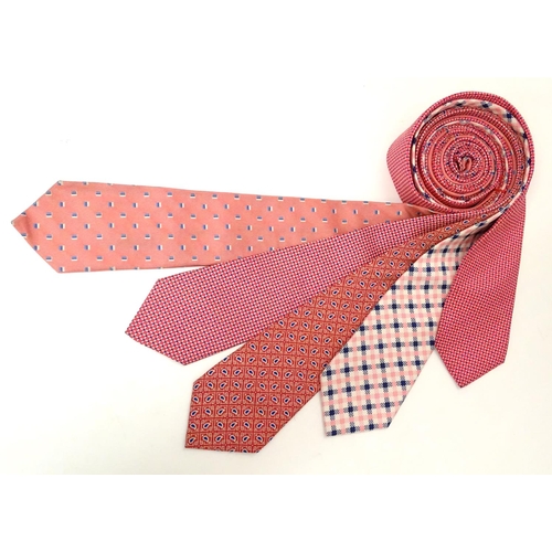 744 - 5 Turnbull & Asser, London, silk ties, in red, pink and blue designs. (5)