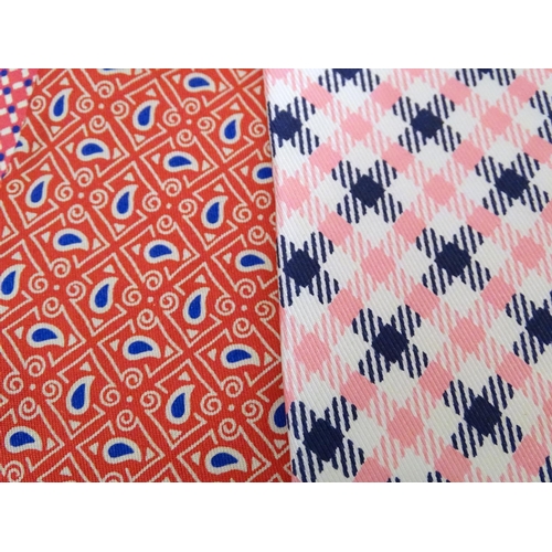 744 - 5 Turnbull & Asser, London, silk ties, in red, pink and blue designs. (5)