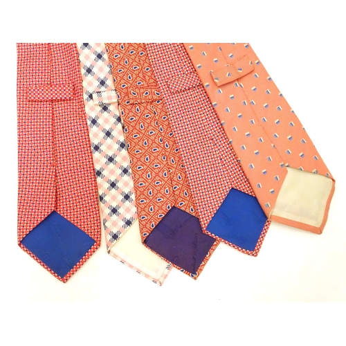 744 - 5 Turnbull & Asser, London, silk ties, in red, pink and blue designs. (5)