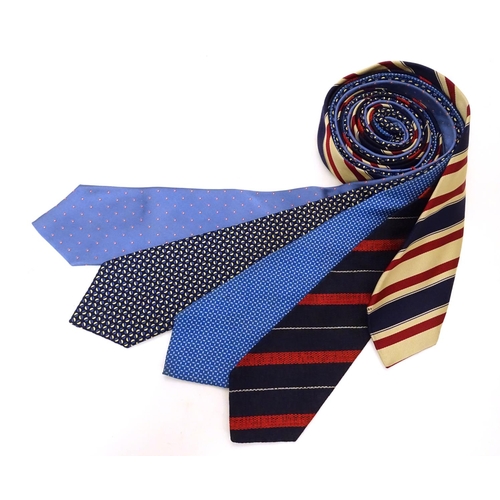 746 - 5 Turnbull & Asser, London silk ties in red and blue designs. (5)