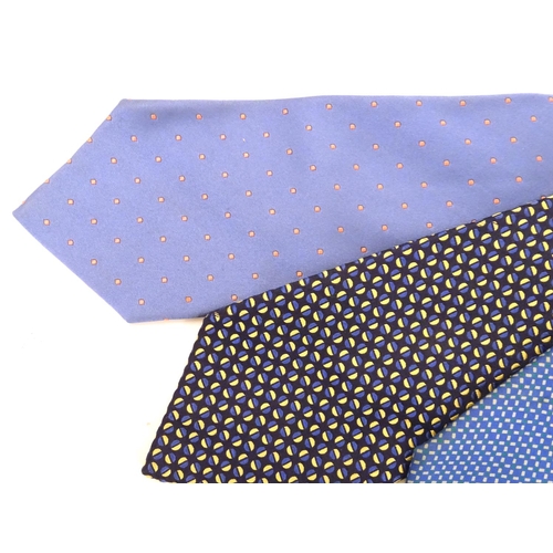 746 - 5 Turnbull & Asser, London silk ties in red and blue designs. (5)