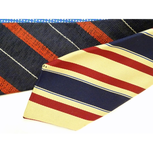 746 - 5 Turnbull & Asser, London silk ties in red and blue designs. (5)