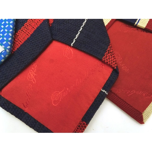 746 - 5 Turnbull & Asser, London silk ties in red and blue designs. (5)