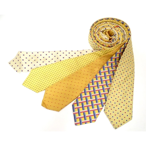 752 - 5 Turnbull & Asser, London silk ties, in yellow, cream, red and blue designs. (5)