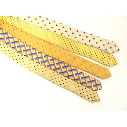 752 - 5 Turnbull & Asser, London silk ties, in yellow, cream, red and blue designs. (5)