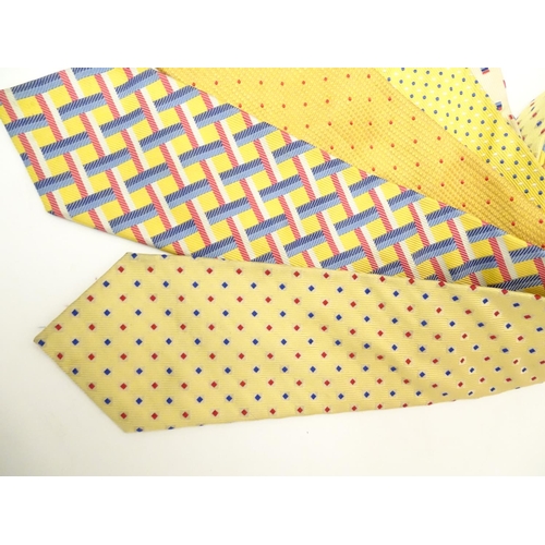 752 - 5 Turnbull & Asser, London silk ties, in yellow, cream, red and blue designs. (5)