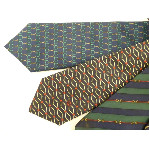 754 - 4 Gucci silk ties, various designs in greens, black and blues (4)