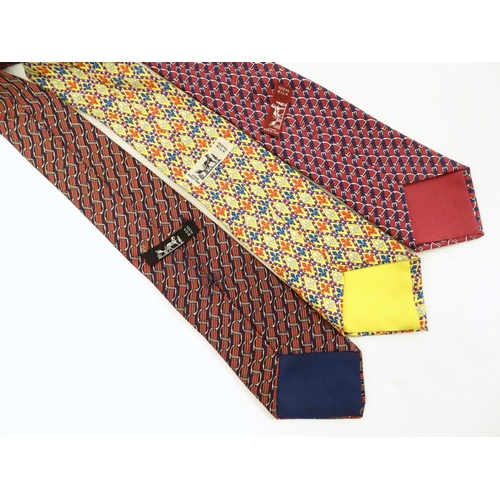 755 - 3 Hermes silk ties, in various colours and designs (3)