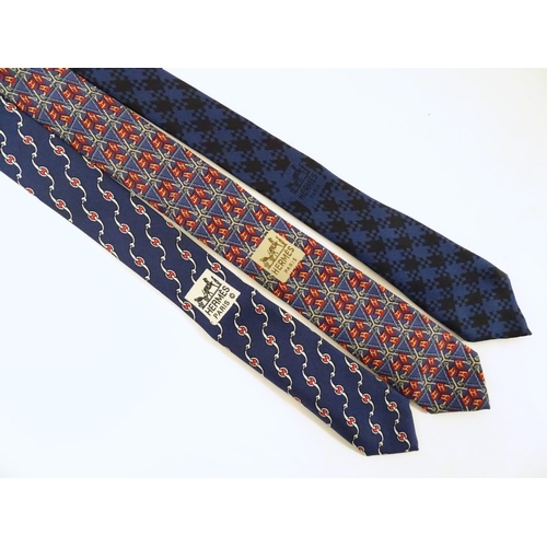 756 - 3 Hermes silk navy and red ties, of various designs (3)