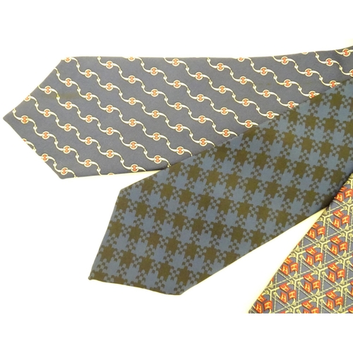 756 - 3 Hermes silk navy and red ties, of various designs (3)