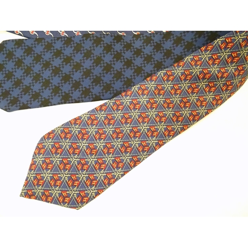 756 - 3 Hermes silk navy and red ties, of various designs (3)