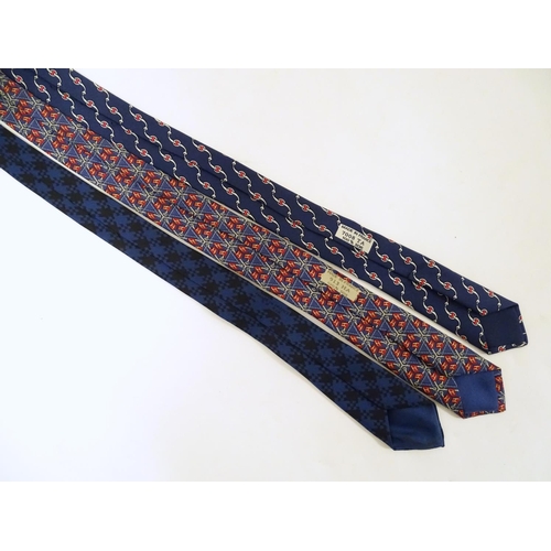 756 - 3 Hermes silk navy and red ties, of various designs (3)