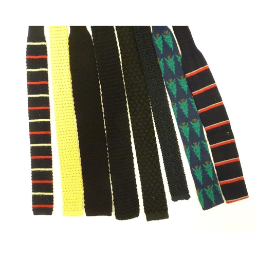 769 - 8 knitted ties in various colours and designs. (8)