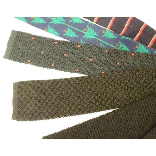 769 - 8 knitted ties in various colours and designs. (8)