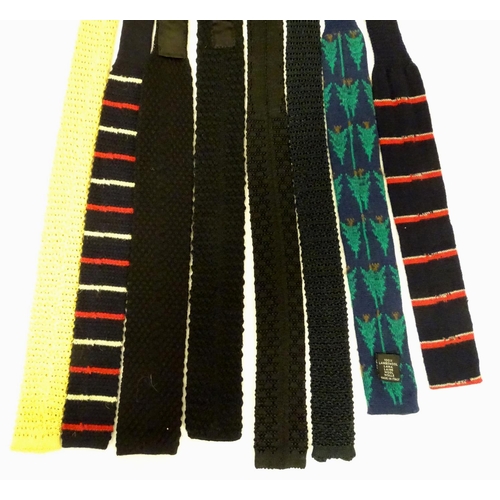 769 - 8 knitted ties in various colours and designs. (8)