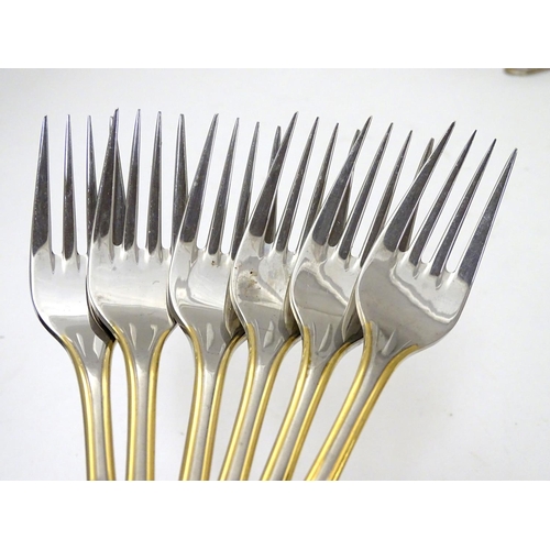 1132 - A six place set of German Furst Furosil stainless cutlery with gilt-edge accent comprising 6 table k... 