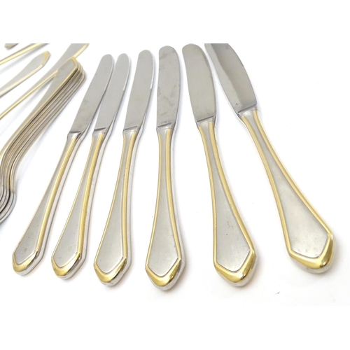 1132 - A six place set of German Furst Furosil stainless cutlery with gilt-edge accent comprising 6 table k... 