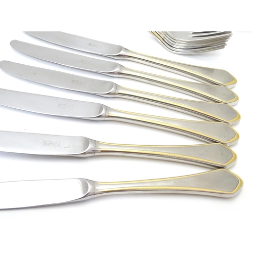 1132 - A six place set of German Furst Furosil stainless cutlery with gilt-edge accent comprising 6 table k... 