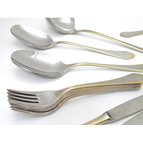 1132 - A six place set of German Furst Furosil stainless cutlery with gilt-edge accent comprising 6 table k... 