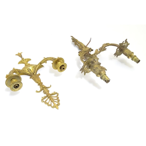 1203 - Two gilt wall light sconces , one a Louis XV Style Wall Light Sconce with acanthus scroll detail, th... 