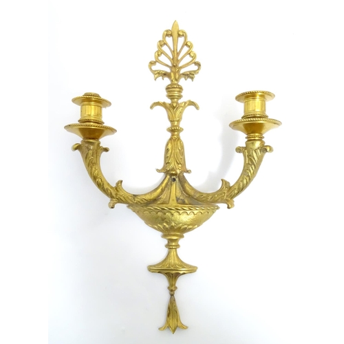 1203 - Two gilt wall light sconces , one a Louis XV Style Wall Light Sconce with acanthus scroll detail, th... 