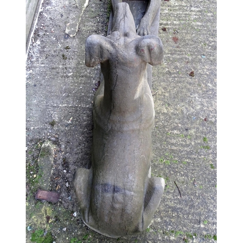 782 - Garden & Architectural, Salvage: a pair of stone garden ornaments formed as couchant hounds / dogs u... 