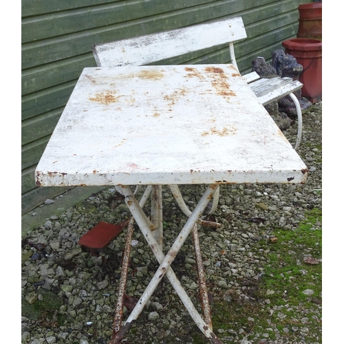 796 - A Victorian garden bench with wrought iron mounts and wooden slatted seat, white painted finish, tog... 