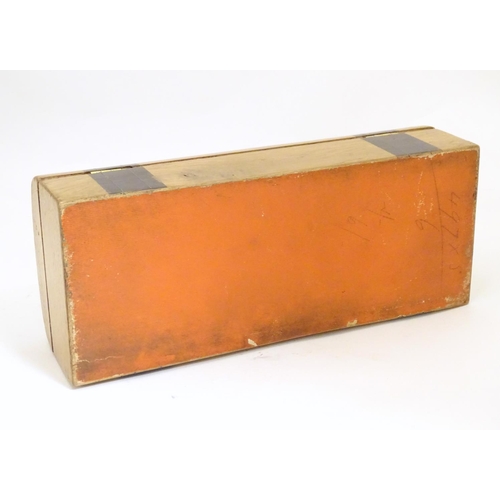 1003 - A late 19th / early 20thC glove box with a domed lid and banded decoration and inlaid stringing deta... 