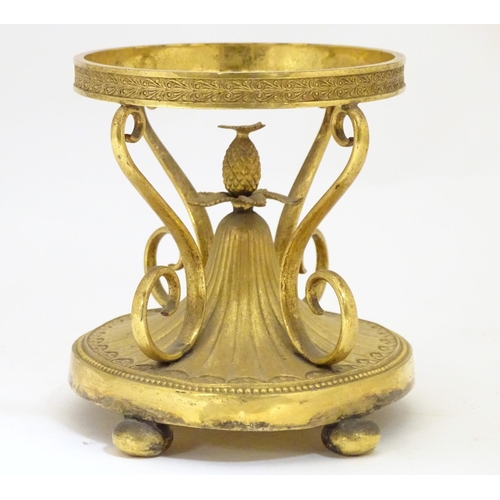 1005 - A c.1903 Elkington & Co. gilt metal oval centrepiece stand with scrolling decoration and central pin... 