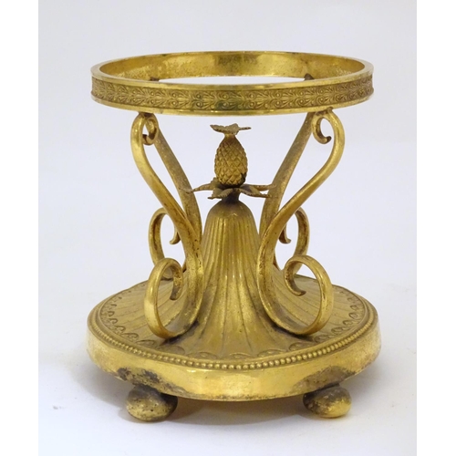 1005 - A c.1903 Elkington & Co. gilt metal oval centrepiece stand with scrolling decoration and central pin... 