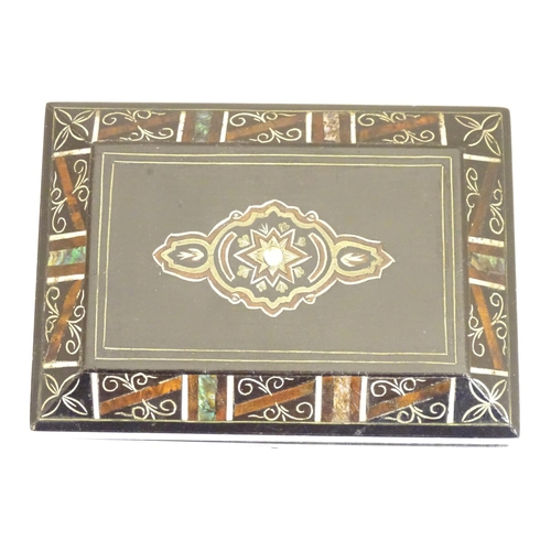 1010 - A Victorian tea caddy with a decorative border and motif with painted detail and inlaid abalone, bon... 