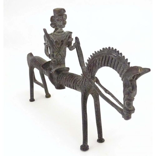 824 - Two Picasso style horse sculptures, an iron example depicting a soldier riding. Approx. 13