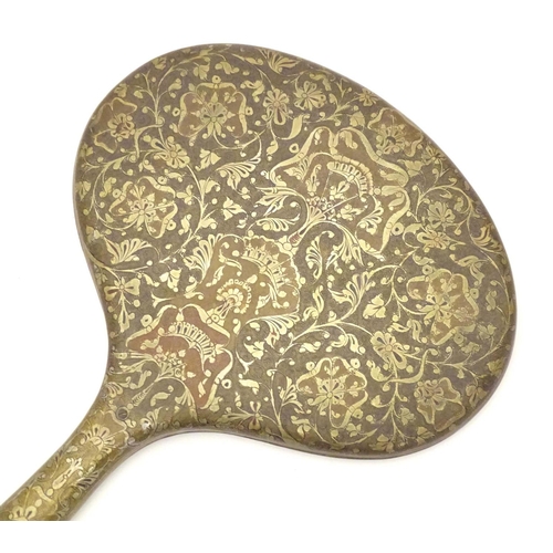 826 - A late 19th / early 20thC hand mirror with Damascene style decorative surround and oval bevelled edg... 