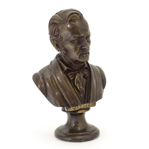 827 - A 19thC cast bronze bust of the German composer Wilhelm Richard Wagner. Approx. 9